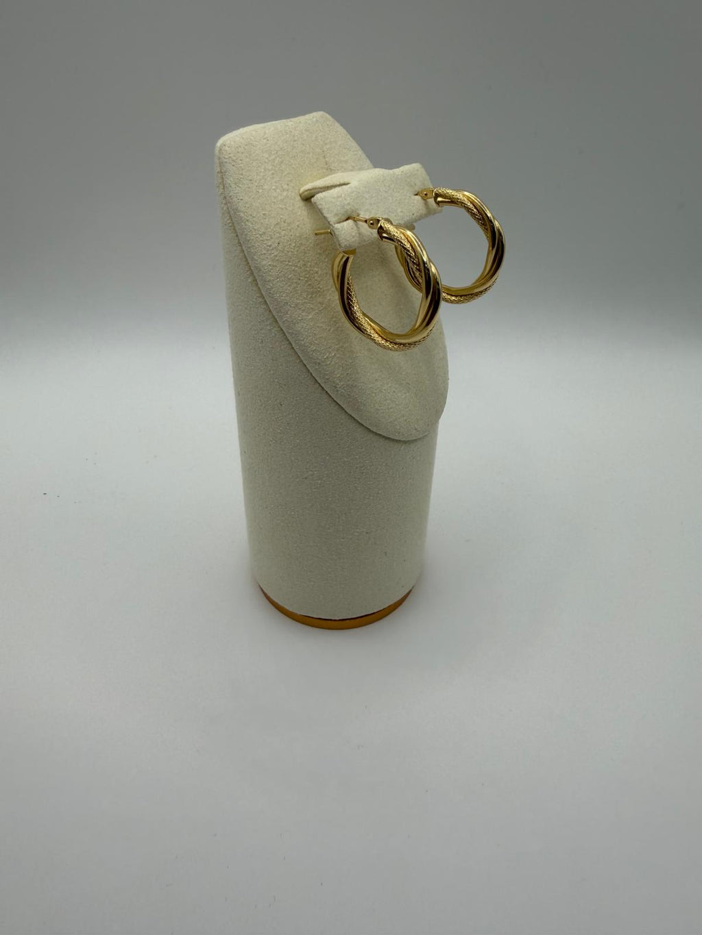 Argollas trenzada en Oro 18K