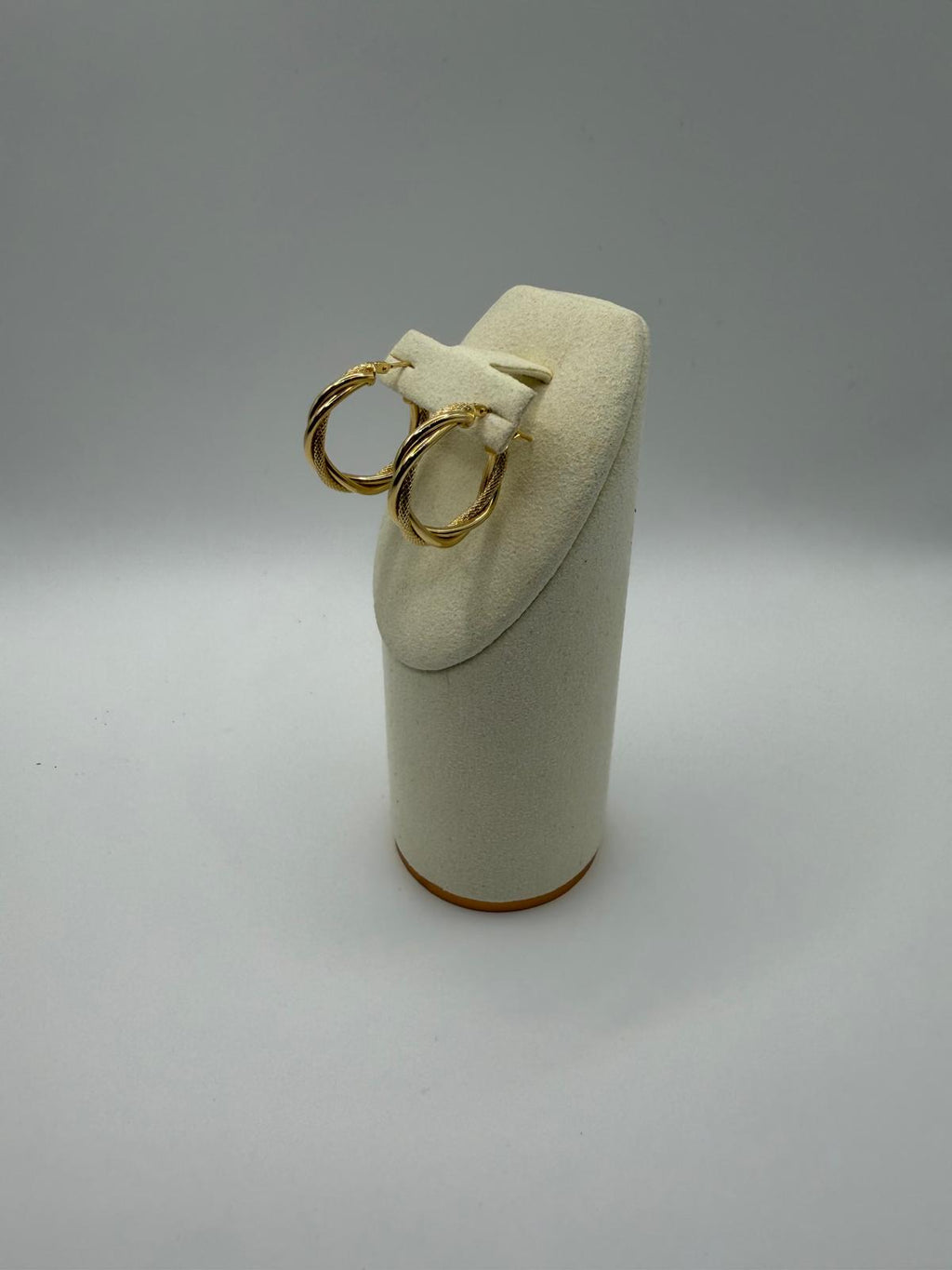 Argollas trenzada en Oro 18K