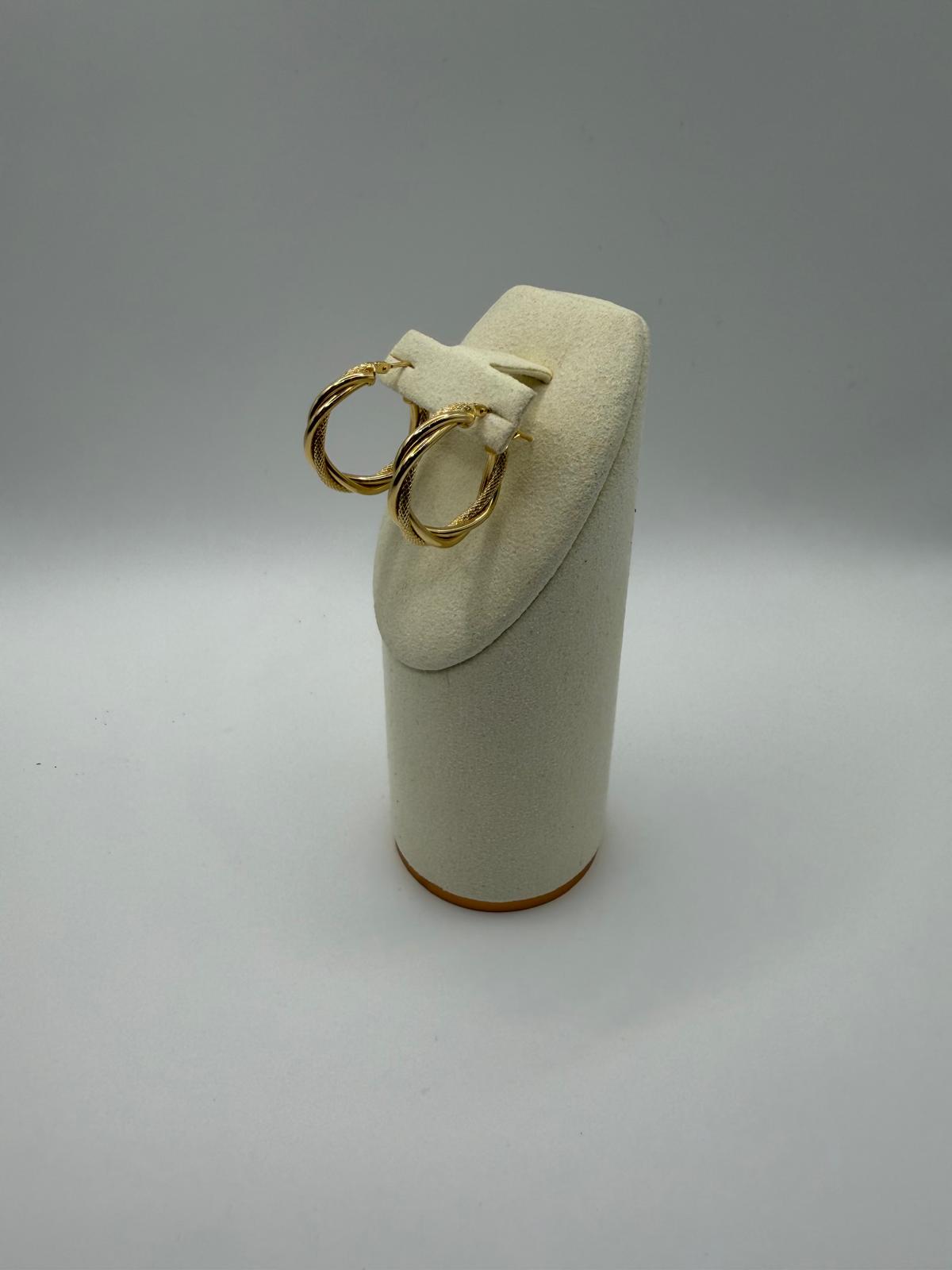 Argollas trenzada en Oro 18K